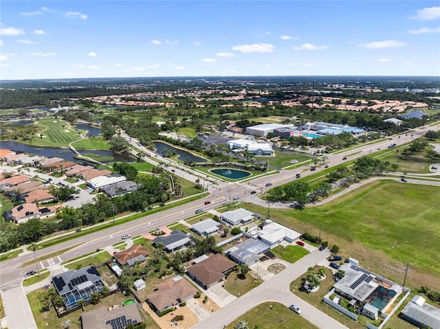 aerial view featuring a water view and a residential view