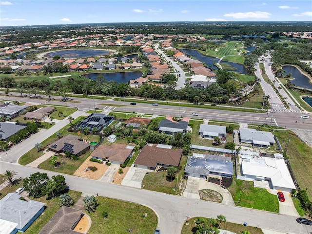 aerial view with a water view and a residential view