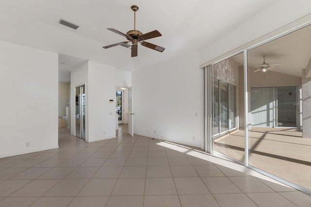 tiled empty room with ceiling fan and visible vents