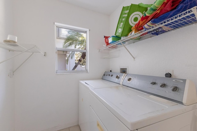 washroom featuring independent washer and dryer and laundry area