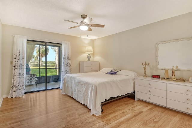 1532 Pelican Point Dr Unit Ba139, Sarasota, FL 34231 - bedroom with ceiling fan, access to outside, and light wood finished floors