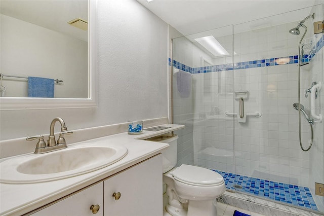 1532 Pelican Point Dr Unit Ba139, Sarasota, FL 34231 - bathroom featuring toilet, vanity, and a shower stall
