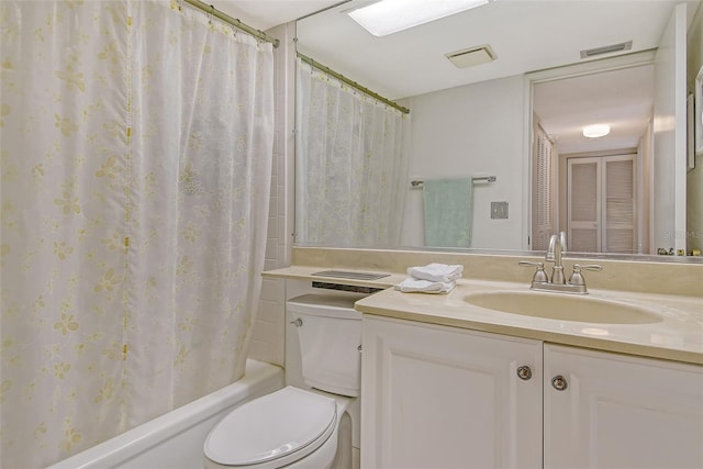 1532 Pelican Point Dr Unit Ba139, Sarasota, FL 34231 - full bathroom featuring visible vents, shower / bath combo, toilet, and vanity