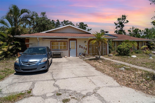 view of front of house featuring concrete driveway