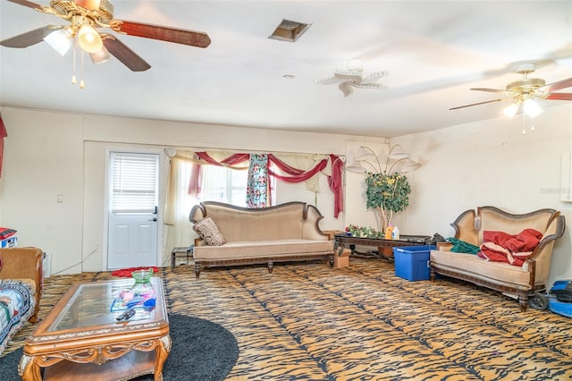 living room featuring carpet flooring and ceiling fan
