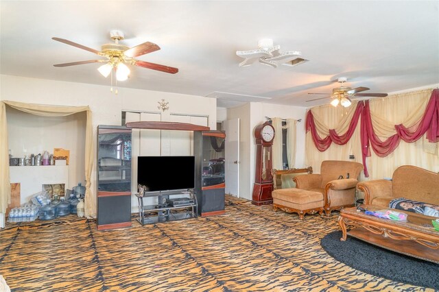 living room with carpet flooring and ceiling fan