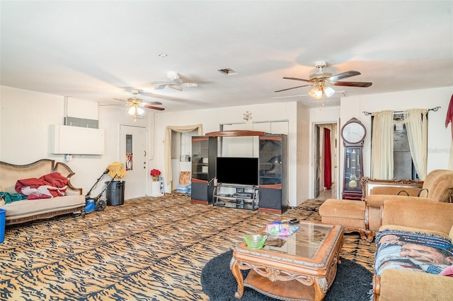 living area featuring carpet floors and a ceiling fan