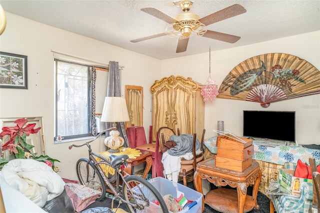 interior space featuring a ceiling fan