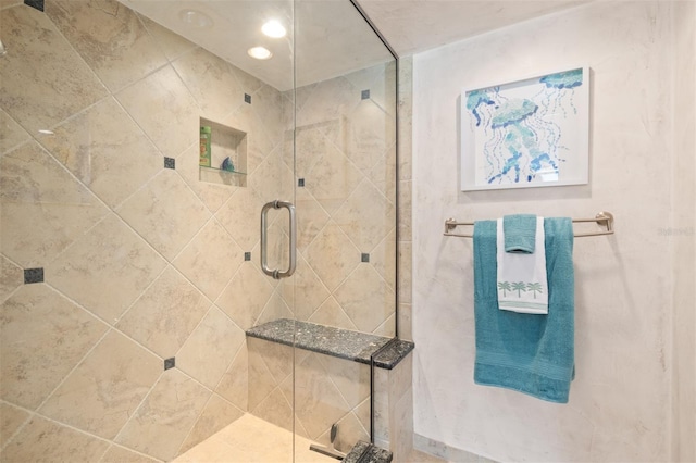 full bathroom with recessed lighting and a stall shower