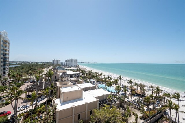 aerial view with a view of the beach and a water view