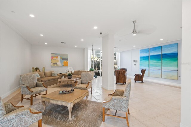 living area with light tile patterned flooring, ceiling fan, and recessed lighting
