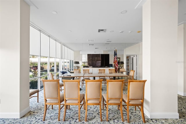 interior space with baseboards and visible vents