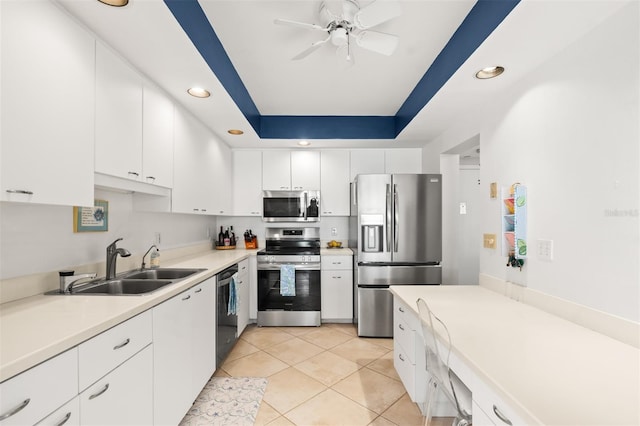 kitchen featuring recessed lighting, appliances with stainless steel finishes, a ceiling fan, and a sink