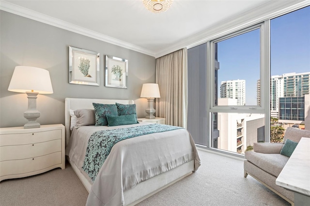 bedroom with a city view, carpet flooring, and ornamental molding