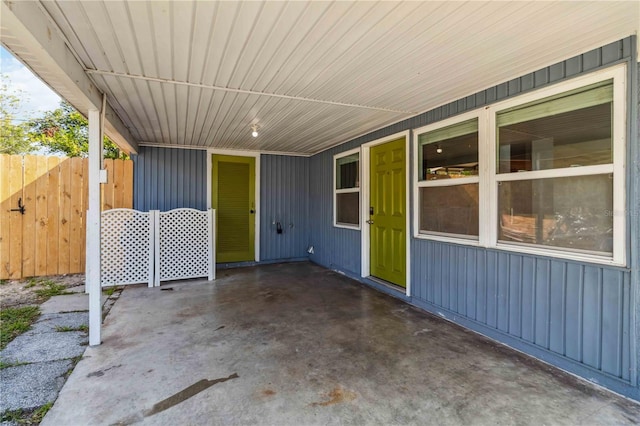 view of patio / terrace featuring fence
