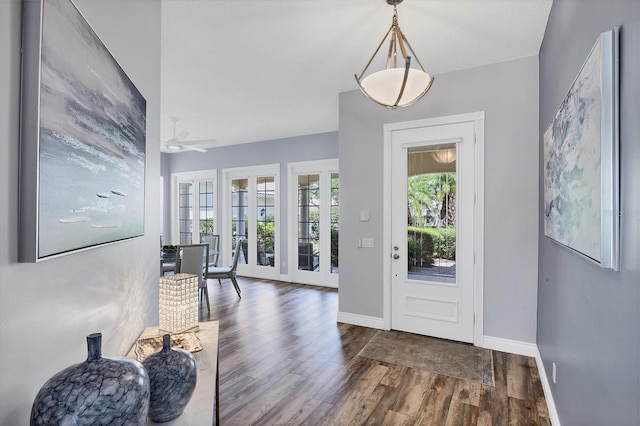 5881 Girona Pl, Sarasota, FL 34238 - foyer with wood finished floors, baseboards, a ceiling fan, and french doors