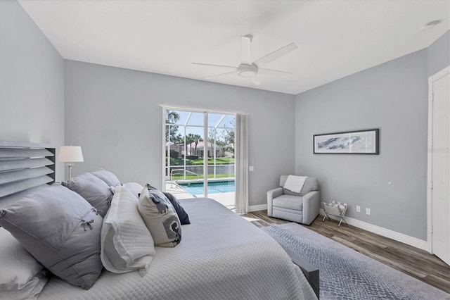 5881 Girona Pl, Sarasota, FL 34238 - bedroom with access to exterior, wood finished floors, baseboards, and a ceiling fan