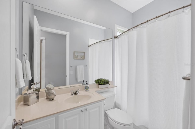 5881 Girona Pl, Sarasota, FL 34238 - bathroom featuring vanity, toilet, and a shower with shower curtain