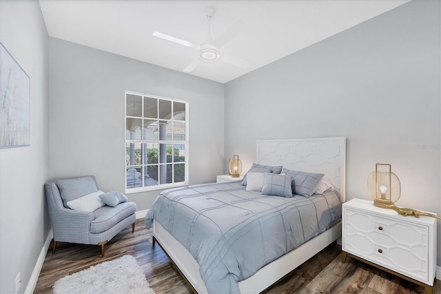 5881 Girona Pl, Sarasota, FL 34238 - bedroom with dark wood-type flooring, baseboards, and ceiling fan
