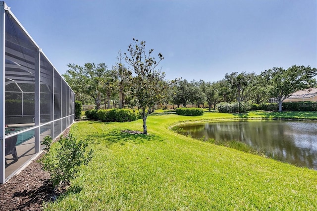 5881 Girona Pl, Sarasota, FL 34238 - view of green lawn featuring a water view and glass enclosure