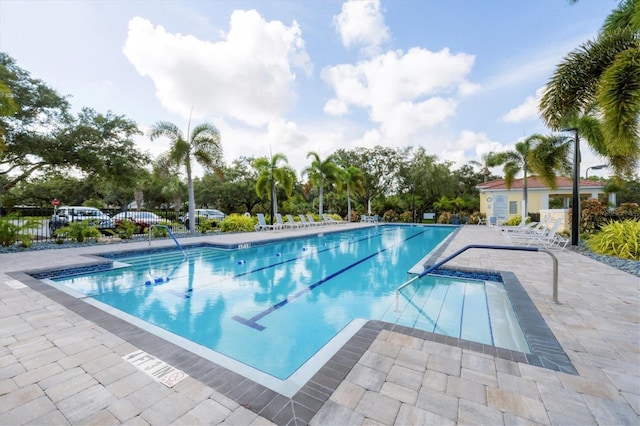 5881 Girona Pl, Sarasota, FL 34238 - community pool featuring a patio