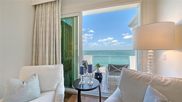 balcony featuring a water view