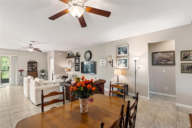 6124 35th Ct E, Bradenton, FL 34203 - dining area featuring light tile patterned flooring, ceiling fan, baseboards, and visible vents