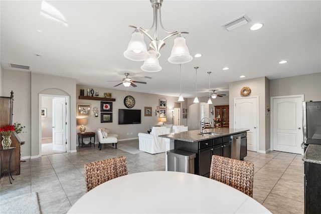 6124 35th Ct E, Bradenton, FL 34203 - dining room with recessed lighting, arched walkways, visible vents, and ceiling fan with notable chandelier