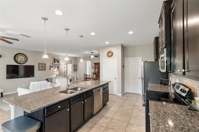 6124 35th Ct E, Bradenton, FL 34203 - kitchen with ceiling fan, appliances with stainless steel finishes, open floor plan, and visible vents
