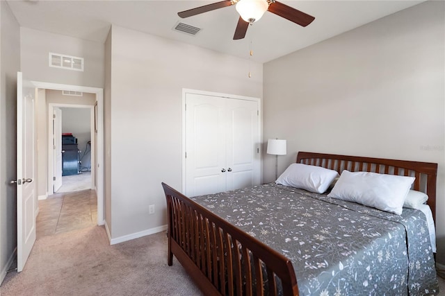 6124 35th Ct E, Bradenton, FL 34203 - carpeted bedroom with visible vents, a closet, and baseboards