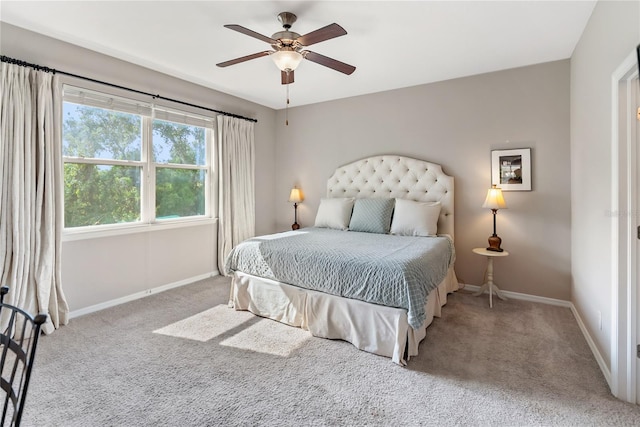 6124 35th Ct E, Bradenton, FL 34203 - bedroom with carpet flooring, ceiling fan, and baseboards
