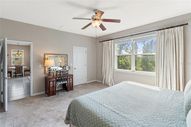 6124 35th Ct E, Bradenton, FL 34203 - bedroom featuring ceiling fan, carpet flooring, and baseboards