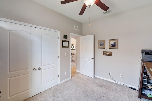 6124 35th Ct E, Bradenton, FL 34203 - carpeted bedroom featuring a closet, visible vents, a ceiling fan, and baseboards