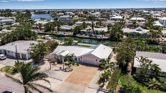 aerial view with a water view and a residential view
