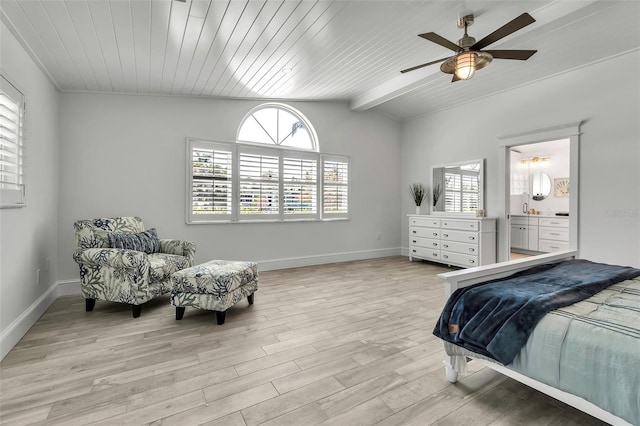 bedroom featuring baseboards, light wood finished floors, ceiling fan, and lofted ceiling with beams
