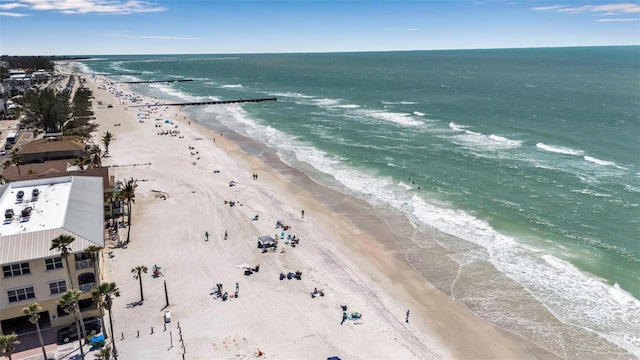 birds eye view of property with a beach view and a water view