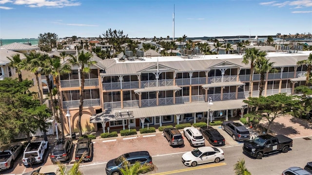 view of property with uncovered parking