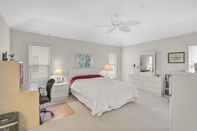 4360 Presidential Avenue Cir E, Bradenton, FL 34203 - bedroom with ceiling fan, multiple windows, and light carpet