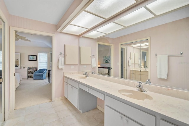 4360 Presidential Avenue Cir E, Bradenton, FL 34203 - ensuite bathroom featuring a sink, ensuite bathroom, tile patterned floors, and double vanity