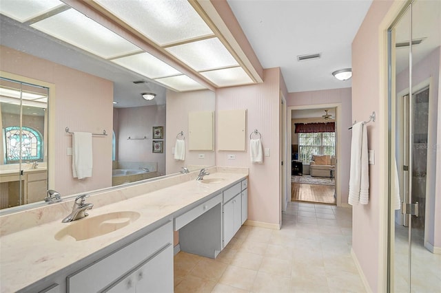 4360 Presidential Avenue Cir E, Bradenton, FL 34203 - ensuite bathroom featuring a sink, visible vents, and double vanity