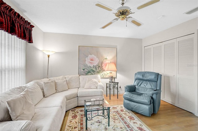4360 Presidential Avenue Cir E, Bradenton, FL 34203 - living room with wood finished floors, a ceiling fan, and visible vents