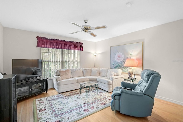 4360 Presidential Avenue Cir E, Bradenton, FL 34203 - living room with baseboards, a ceiling fan, and wood finished floors