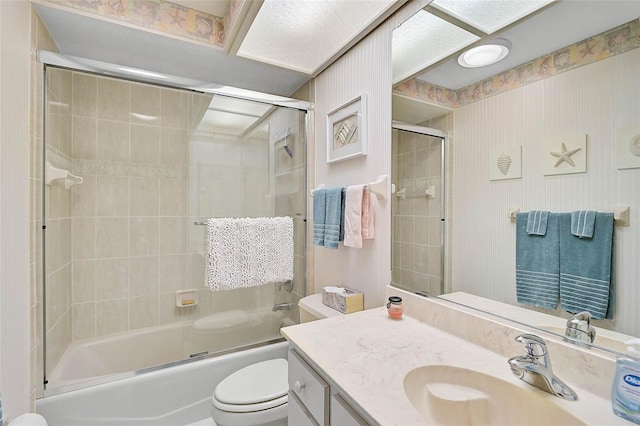 4360 Presidential Avenue Cir E, Bradenton, FL 34203 - bathroom with toilet, shower / bath combination with glass door, and vanity