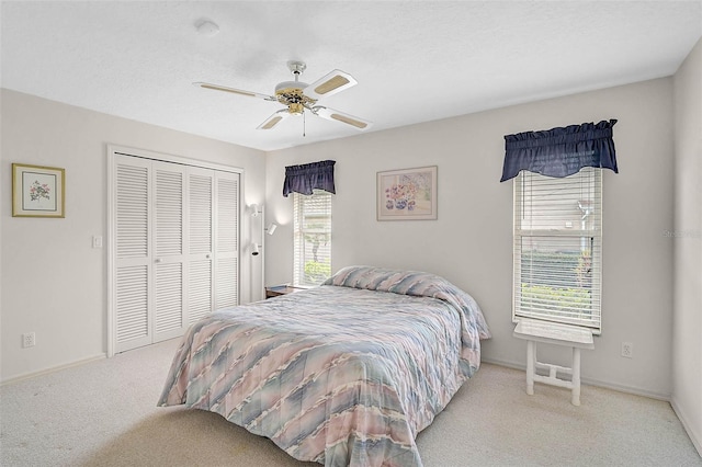 4360 Presidential Avenue Cir E, Bradenton, FL 34203 - carpeted bedroom with a closet, ceiling fan, and baseboards