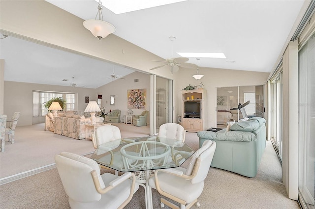 4360 Presidential Avenue Cir E, Bradenton, FL 34203 - dining space featuring vaulted ceiling with skylight, light colored carpet, and a ceiling fan