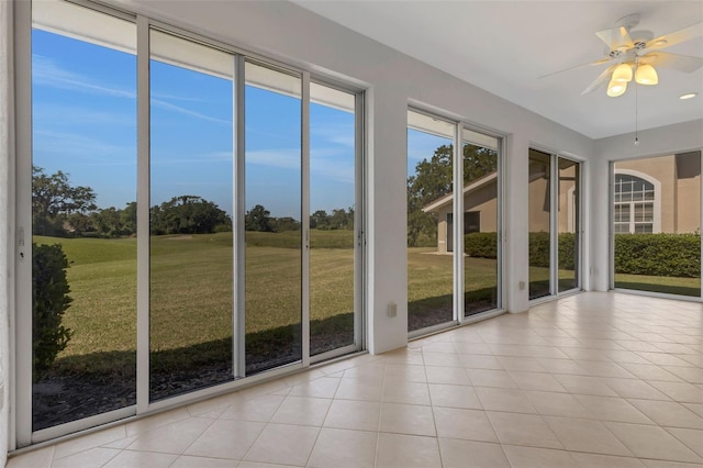 4044 Penshurst Park, Sarasota, FL 34235 - unfurnished sunroom featuring tile patterned floors