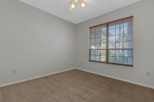 4044 Penshurst Park, Sarasota, FL 34235 - carpeted spare room featuring baseboards and a ceiling fan
