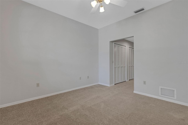 4044 Penshurst Park, Sarasota, FL 34235 - empty room with light carpet, ceiling fan, baseboards, and visible vents