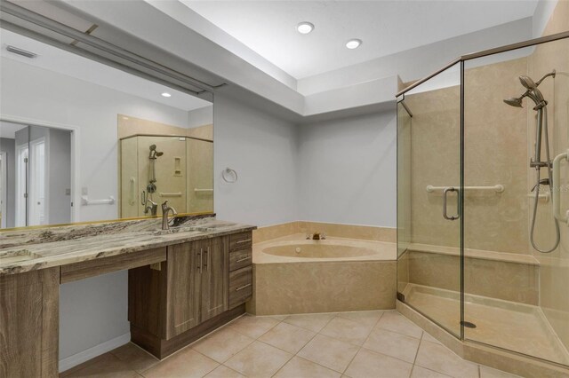 4044 Penshurst Park, Sarasota, FL 34235 - bathroom featuring visible vents, a bath, vanity, tile patterned flooring, and a stall shower