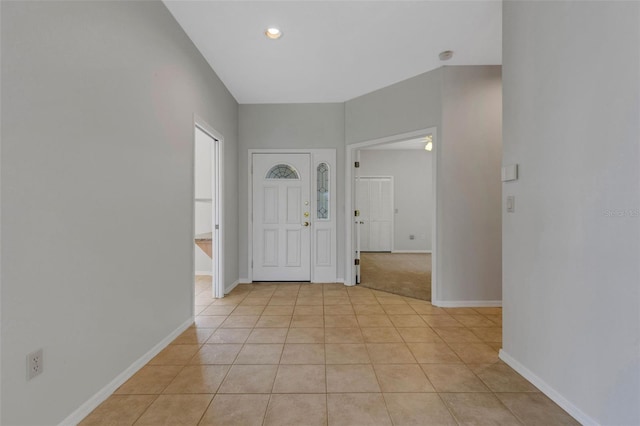 4044 Penshurst Park, Sarasota, FL 34235 - foyer entrance with recessed lighting, light tile patterned floors, and baseboards